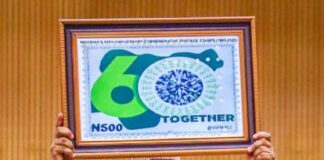 Pantami Unveils Nigeria@60 Commemorative Postage Stamps Dr. Isa Ali Ibrahim showcases symbolic Postage Stamp