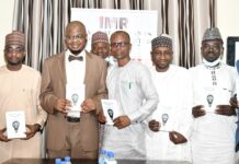 Pantami Dedicates Book To President Buhari For Commitment to Digital Innovation L-R The Minister of communication and digital Economy, Dr. Isa Ali Ibrahim pantami, Book Author, Mr Inyene Ibanga and other dignitaries during the book launch in Abuja