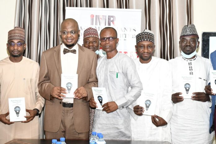 L-R The Minister of communication and digital Economy, Dr. Isa Ali Ibrahim pantami, Book Author, Mr Inyene Ibanga and other dignitaries during the book launch in Abuja