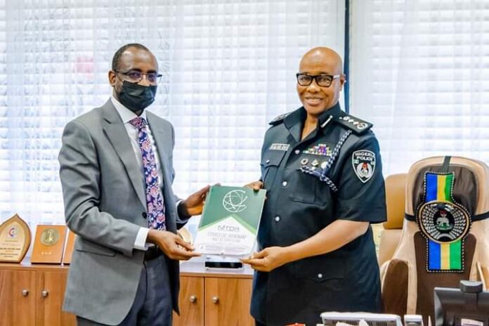 L-r: Kashifu Inuwa Abdullahi, director general, National Information Technology Development Agency (NITDA) and Usman Alkali Baba, Inspector General of Police (IGP),