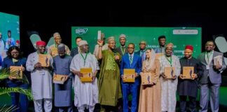 Pantami’s Book on ‘Advancing Nigeria’s Digital Economy’ Unveiled Pantami (in a green brocade at the middle) with guests at his book launching