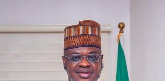 Buhari Confers ‘Digital Innovation Award’ on Pantami Pantami holding the award plaque he received from President Buhari