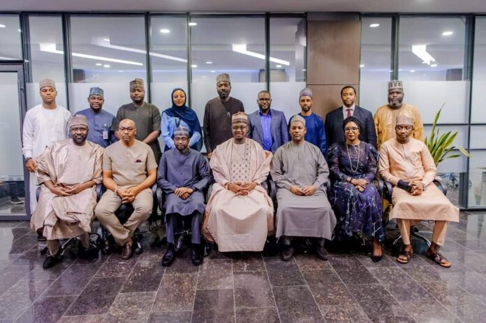 Minister of Communications and Digital Economy, Prof. Isa Ali Ibrahim (Pantami) in a group photograph with members of the Nigeria Startup Act Implementation Committee