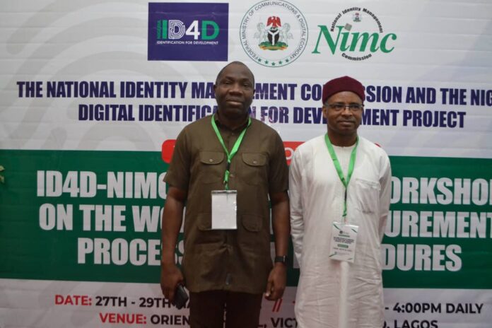 NIMC DG, Engr. Aliyu Aziz Abubakar with ID4D project Communications Manager, Dr. Walter Duru