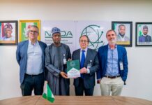 NITDA Boss Encourages Global Investors to Explore Nigeria’s Thriving Digital Market The Ambassador of Spain to Nigeria, Juan Sell, being presented with NITDA SRAP Documents by DG's Representative, Dr Usman Abdullahi Gambo, flanked by Reps of SEIDOR