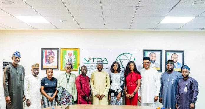 DG NITDA, Kashifu with Executive Director of Operations and Programmes of Afre.lib Mrs Joice Gomina, members of NITDA Management team and other representatives of Afre.lib