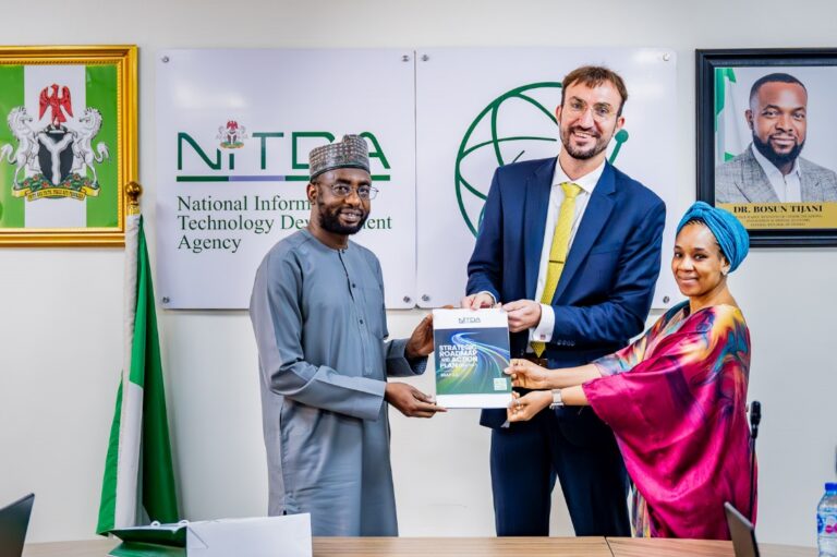 DG NITDA, Kashifu Inuwa, CCIE presenting a copy of agency’s SRAP 2024-2027 to representatives of Workd Bank and World Trade Organisation, Washington DC Office, Aleksandar Stojanor and Dr. Maryam Lawal for the Digital trade engagement.
