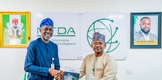 NITDA, FCT UBEB, Collaborate To Foster Digital Literacy In Schools DG rep., Director ITIS, Mr Oladejo Olawumi (left) presenting the agency's SRAP to the Ag. Chairman, FCT-UBEB, Dr Alhassan Sule (right)