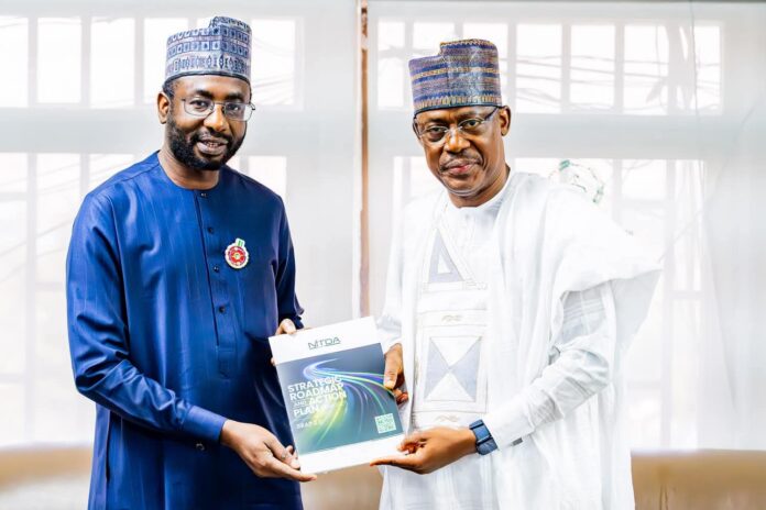 L-R: DG NITDA, Kashifu Inuwa Abdullahi CCIE with Executive Secretary of the NUC, Chris J. Maiyaki