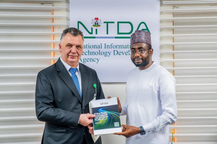 NITDA DG, Kashifu Inuwa Abdullahi CCIE with Ukrainian Ambassador to Nigeria, Ivan Kholostenko NITDA DG, Kashifu Inuwa Abdullahi CCIE with Ivan Kholostenko